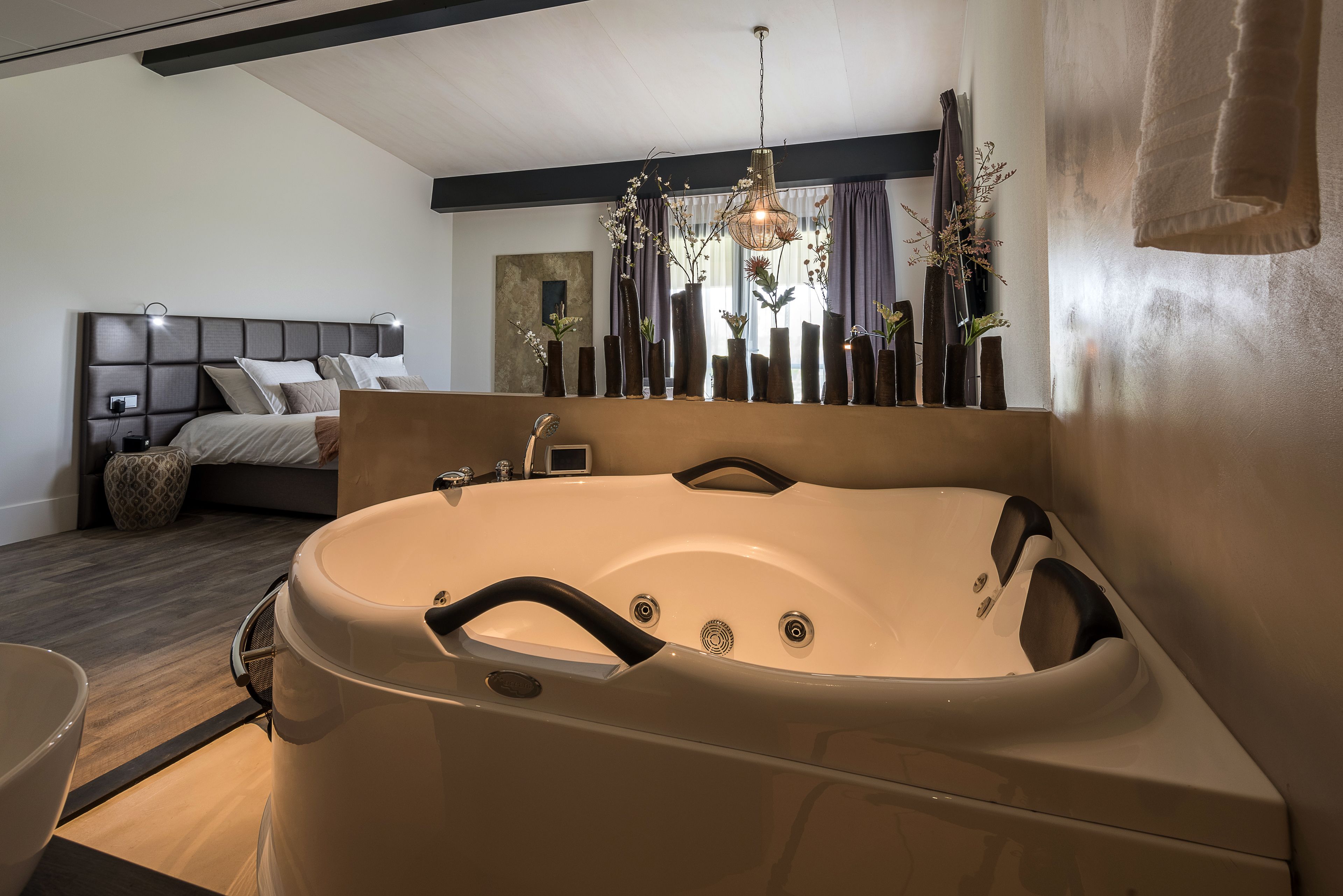 luxury suite, jetted tub | 1 bedroom, premium bedding, minibar, in-room safe