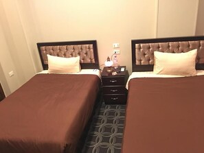 Standard Twin Room | Minibar, individually decorated, blackout curtains, iron/ironing board