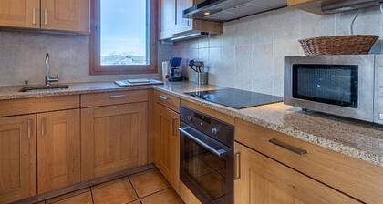 Ski-in/Ski-out Chalet with Balcony, Garage, and Stunning Mountain Views