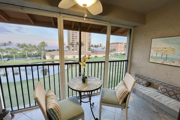 Enjoy watching the sun rise and golfers from your screened patio.