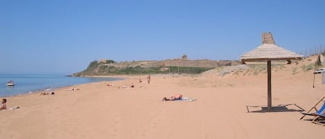 Beach nearby, sun loungers