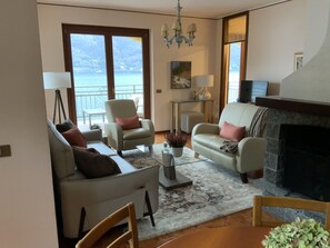 TV, fireplace, books, printers - Lake Front with Large Balcony, Lake Access & Boat Dock (NESSO)