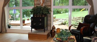 LARGE Apartment with private entrance, car port, deck, and firepit, Sleeps 4.