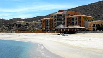 On the beach, sun loungers, beach towels