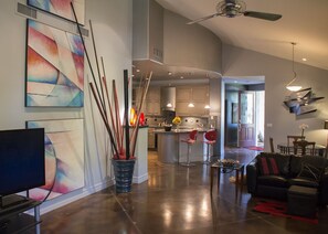 a view from the great room into the contemporary dining and kitchen 