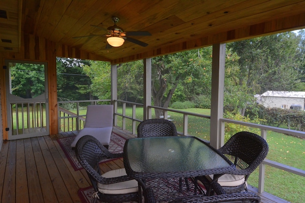 Screened porch to enjoy the morning or evening hours.