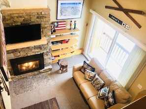 Flat-screen TV, fireplace, DVD player