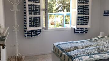 2 dormitorios, tabla de planchar con plancha, wifi y ropa de cama