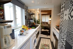 Fridge, microwave, dishwasher, coffee/tea maker