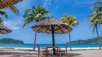 On the beach, beach towels