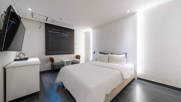 Deluxe tweepersoonskamer | Een gratis minibar, verduisterende gordijnen, geluiddichte muren