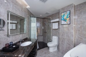 A modern bathroom with a glass-enclosed shower, a white toilet, and a marble sink. - Shanghai Future Shangju Hotel (Shanghai)