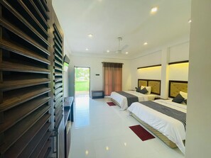Luxury Quadruple Room | In-room safe, desk, laptop workspace, iron/ironing board