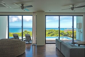 side.B sora, Luxury Condominium with Private Pool | Living area | Flat-screen TV