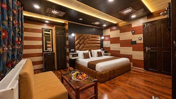 Premium bedding, down comforters, pillowtop beds, in-room safe