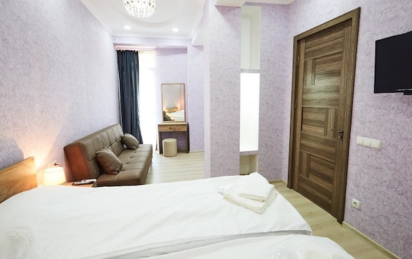 Appartement, meerdere bedden, niet-roken | Een bureau, een strijkplank/strijkijzer, gratis wifi, beddengoed