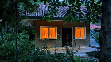 Tribal Cottages | Desk, rollaway beds, bed sheets