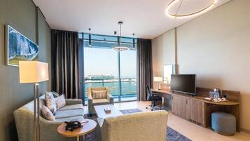 55-inch flat-screen TV with satellite channels, TV