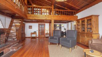 Superior Chalet, Multiple Beds, Non Smoking, Mountain View | Living area | Flat-screen TV, fireplace