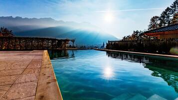 Outdoor pool, pool umbrellas, sun loungers