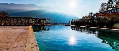 Outdoor pool, pool umbrellas, sun loungers