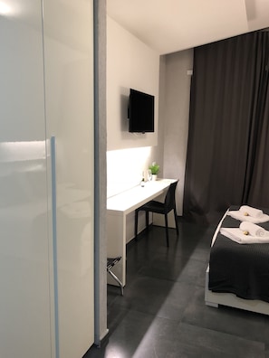 1 bedroom, desk, blackout curtains, iron/ironing board
