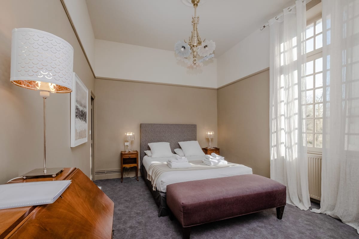 Deluxe Double Room, 1 Queen Bed, Private Bathroom, Courtyard View (Blanche) | 1 bedroom, down comforters, individually decorated