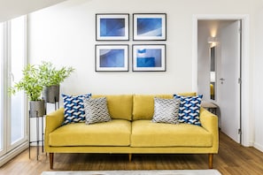 Apartment, 2 Bedrooms (3E) | Living room | Flat-screen TV