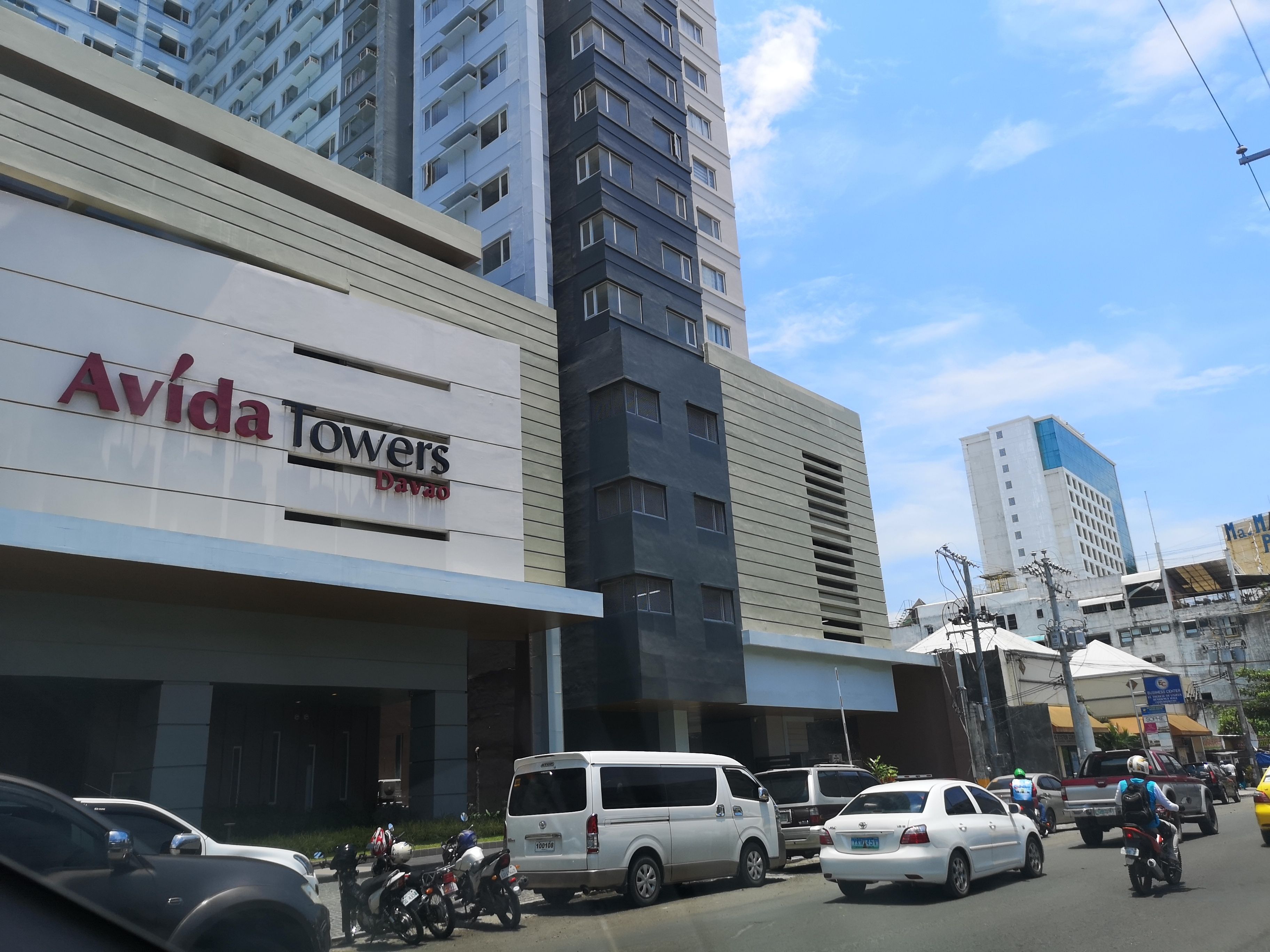 A building with a sign reading "Avida Towers Davao".