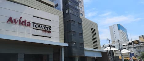 A building with a sign reading "Avida Towers Davao".