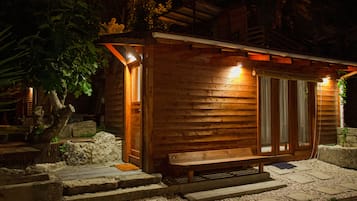 Quarto família, cozinha americana, vista para o jardim | Terraço/pátio