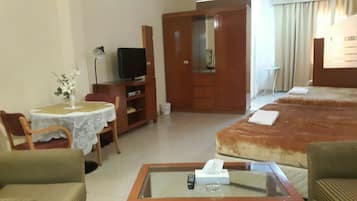 Deluxe Quadruple Room | Premium bedding, minibar, in-room safe, individually decorated