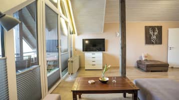 Comfort Apartment, 1 Bedroom, Non Smoking, Mountain View | Ruang tamu | Buku-buku