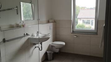 Standard Apartment, Multiple Bedrooms, Non Smoking | Bathroom | Shower, slippers, towels, soap