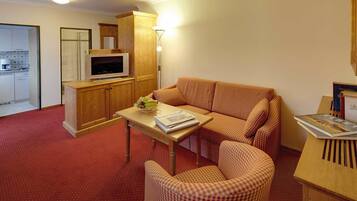 Apartment, 1 Bedroom, Balcony | Living area | Flat-screen TV