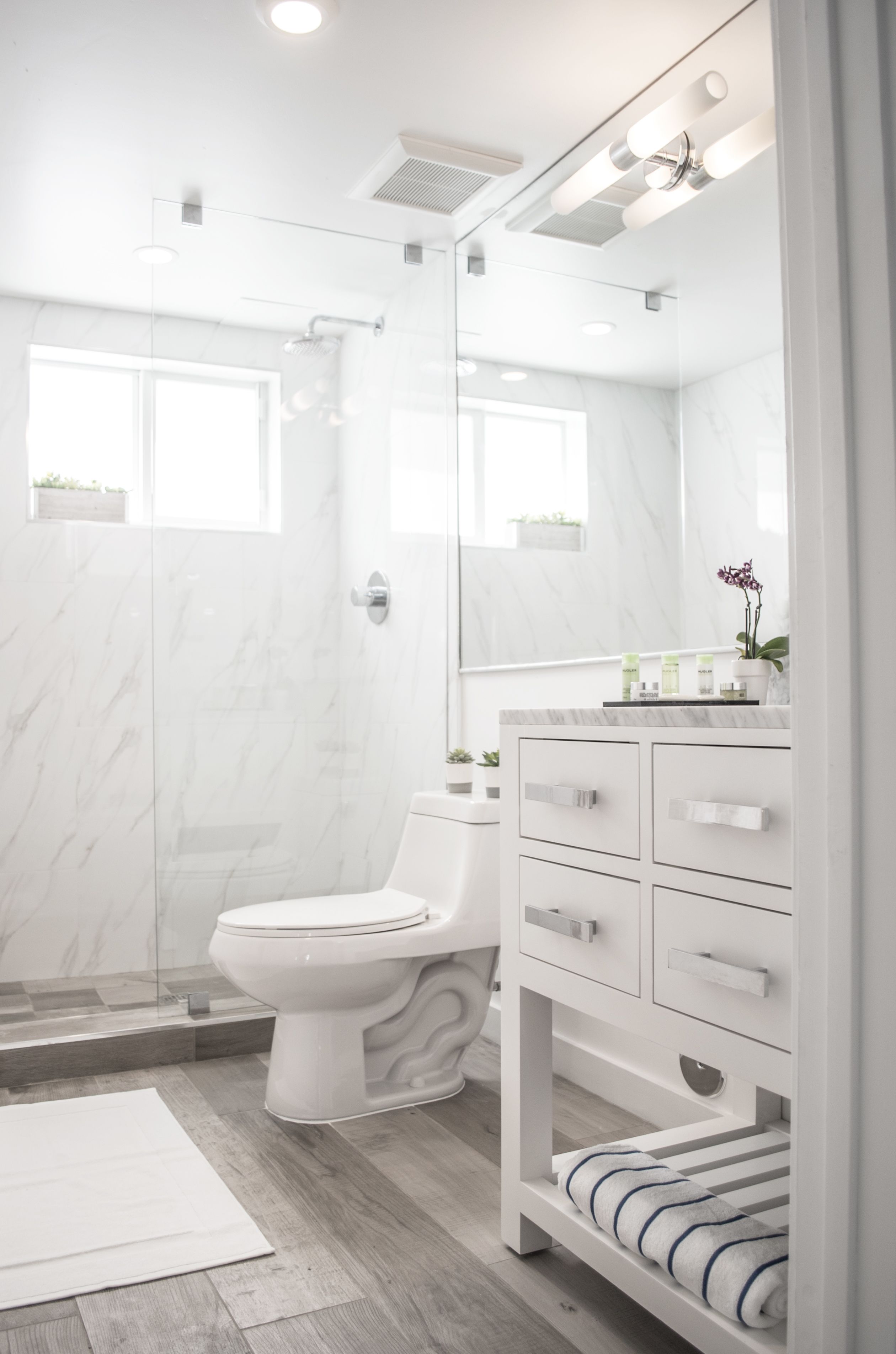 shower, rainfall showerhead, designer toiletries, hair dryer