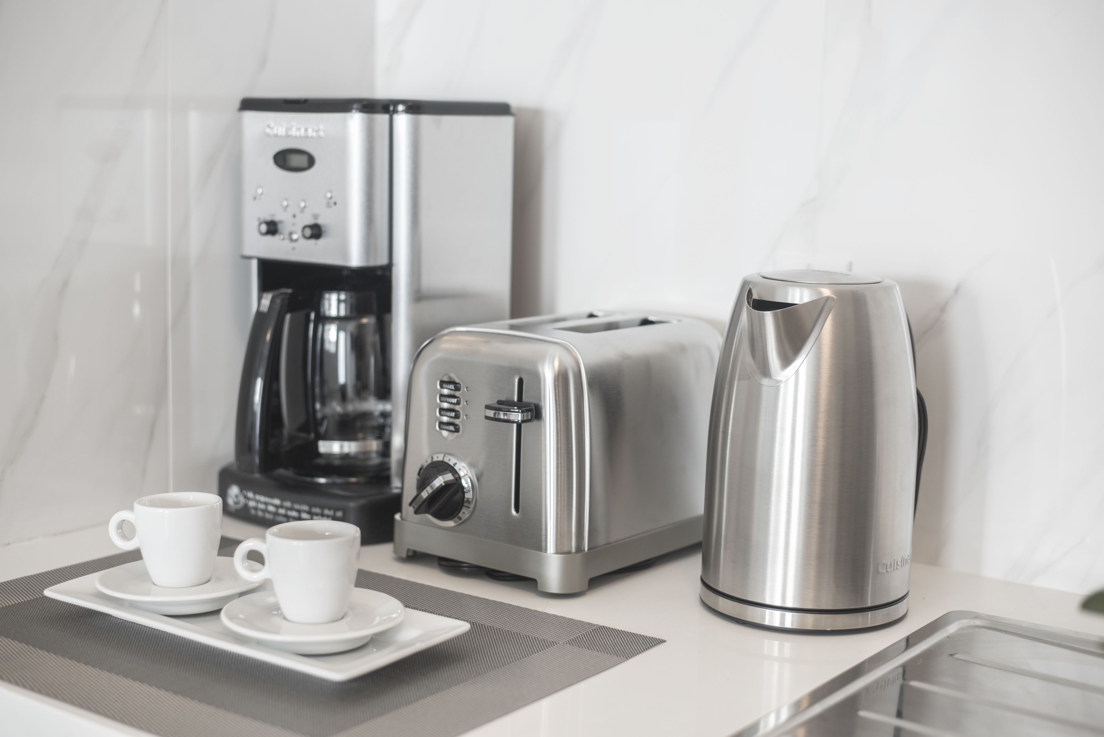 full-sized fridge, microwave, stovetop, dishwasher