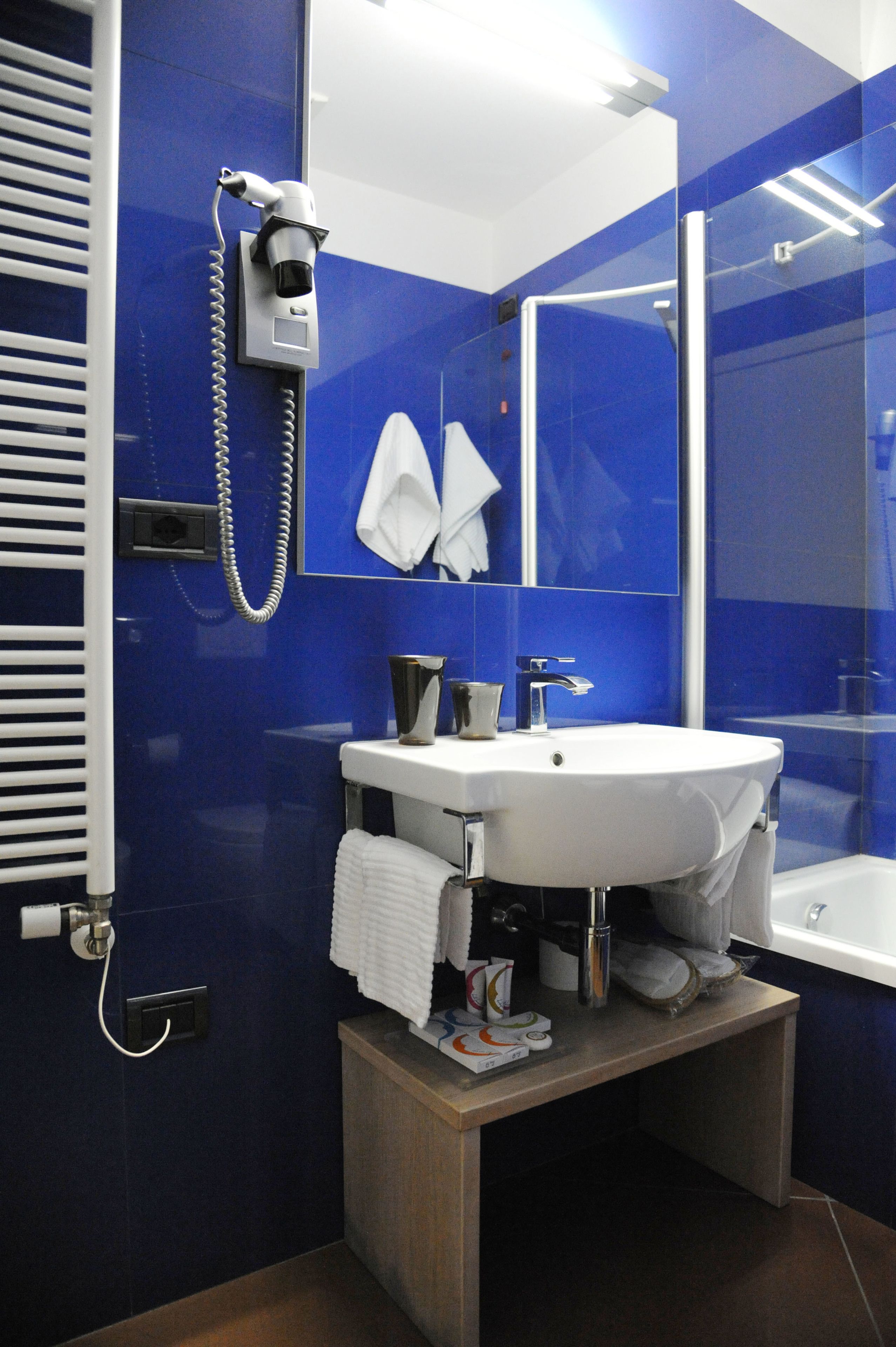 shower, free toiletries, hair dryer, slippers