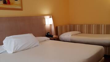 Triple Room, Multiple Beds, Non Smoking | Minibar, in-room safe, desk, soundproofing