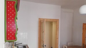 City Apartment | Private kitchenette | Coffee/tea maker, full-sized fridge, stovetop, electric kettle - By the Black Church Apartment (Brasov)