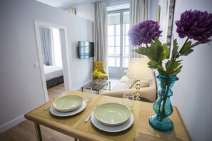 Superior Apartment, 1 Bedroom | Living area | Flat-screen TV