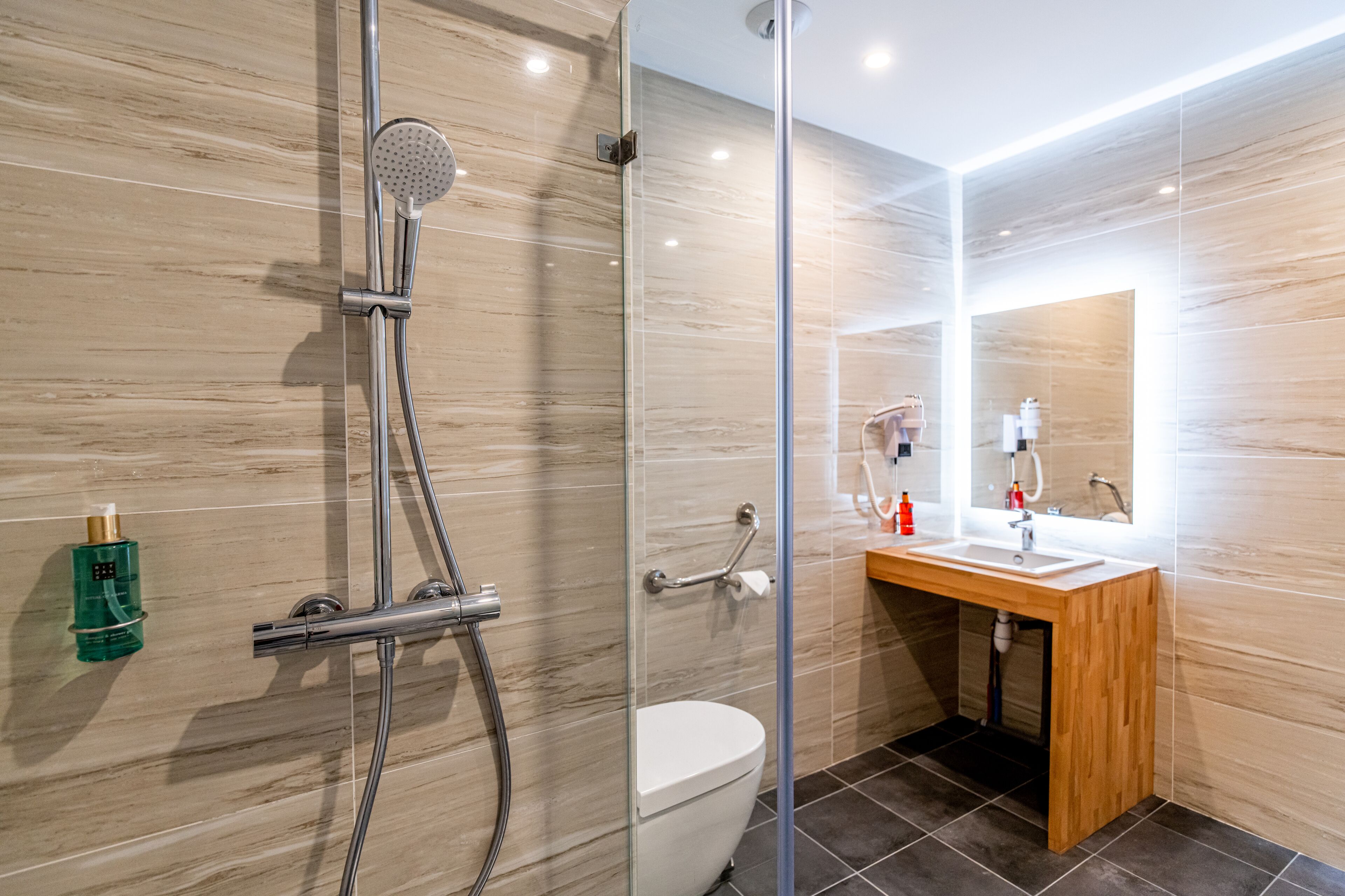 shower, rainfall showerhead, designer toiletries, hair dryer