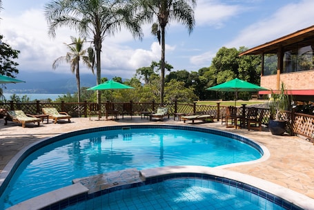 2 outdoor pools, open 9:00 AM to 10:00 PM, free cabanas, pool umbrellas