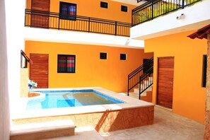 Outdoor pool, pool umbrellas, pool loungers