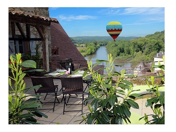 Our amazing terrace with a beautiful view over the river.