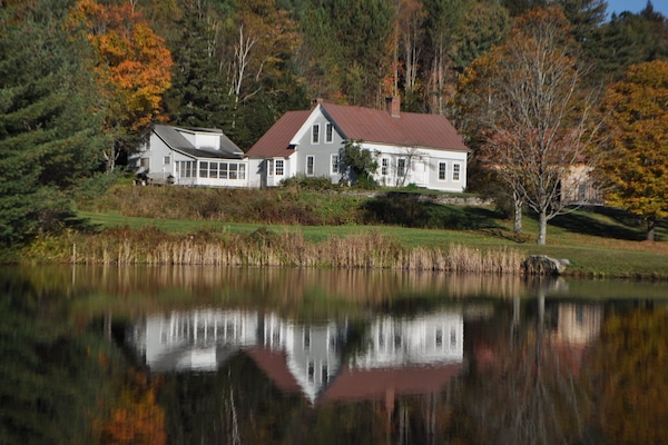 looking at house from swimming pond