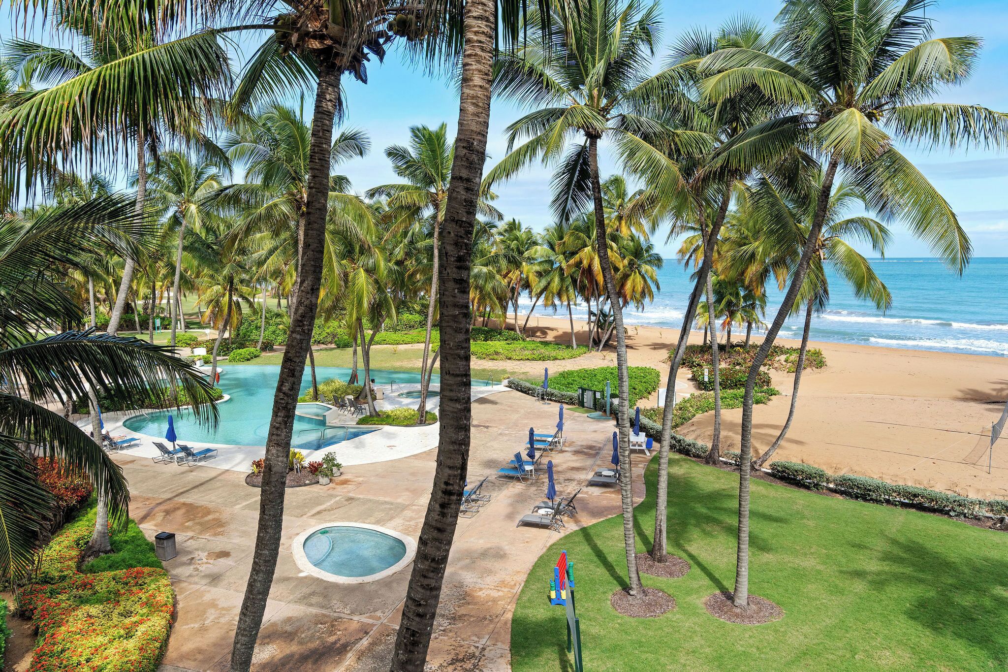 On the beach, sun loungers, beach towels
