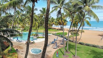 On the beach, sun loungers, beach towels