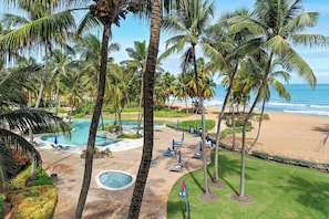 On the beach, sun-loungers, beach towels - Inside The Wyndham Resort Casino & Spa/ Across From Rain Forest / New & Updated (Rio Grande)