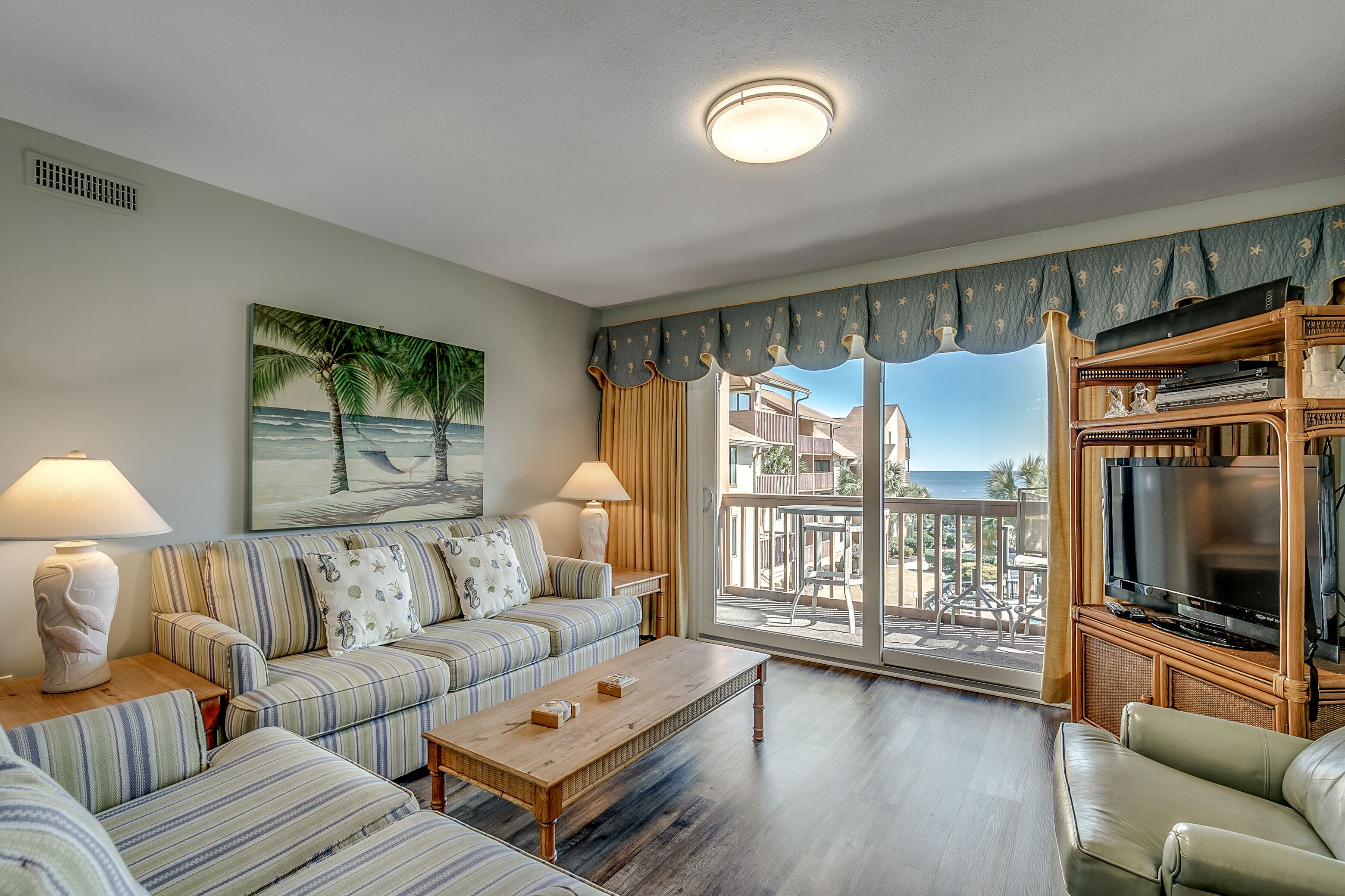 Large Condo- Beautiful Views of the Pool, Courtyard and Ocean, 2 Balconies!